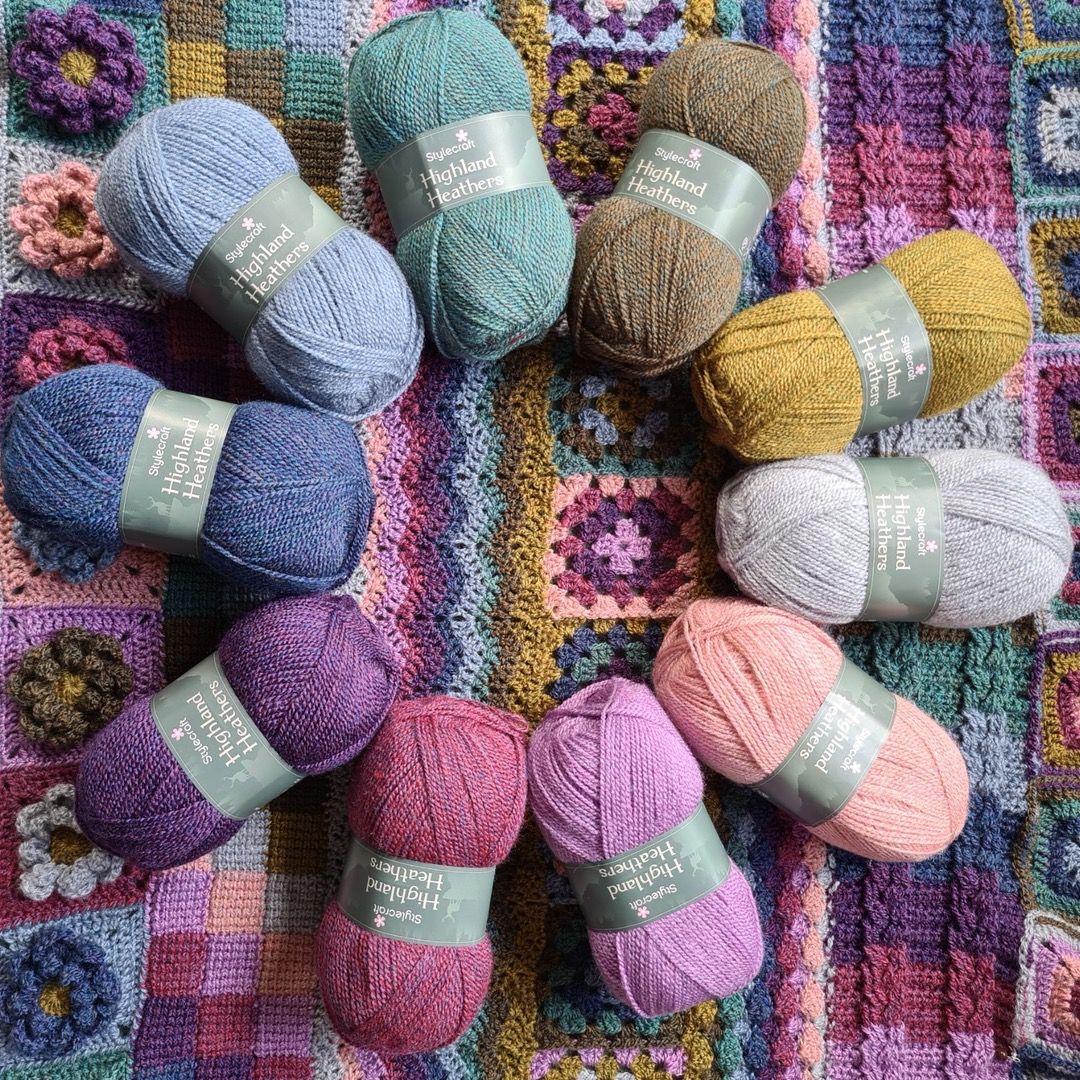 A ring of tweedy muted yarn in different colours