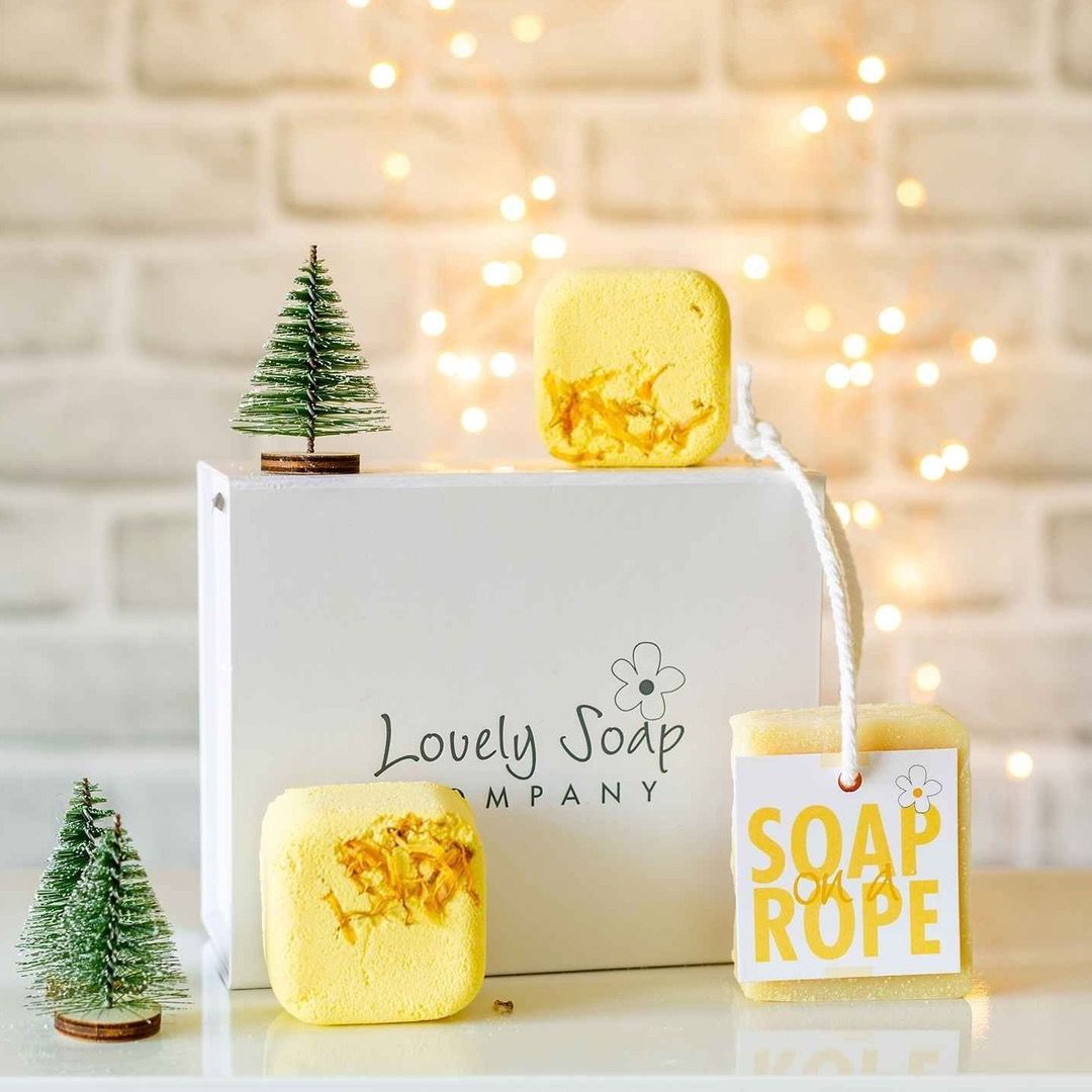 A soap box featuring three different yellow soaps
