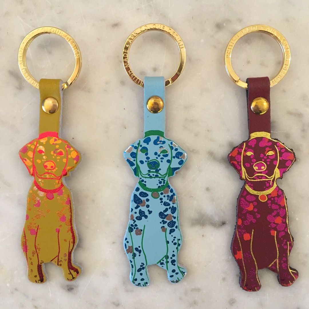 Three brightly coloured dalmation leather keyrings