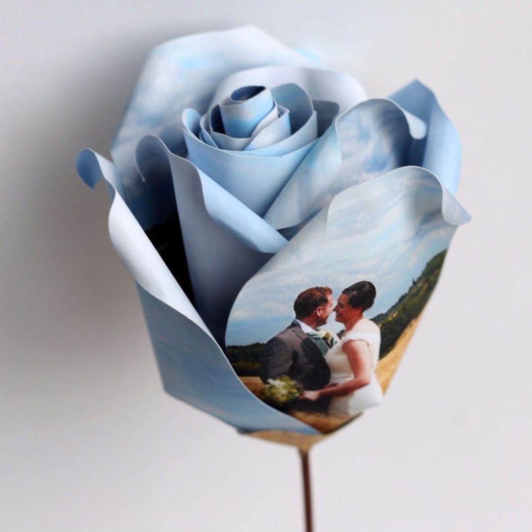 A rose where the petals are formed with a wedding picture