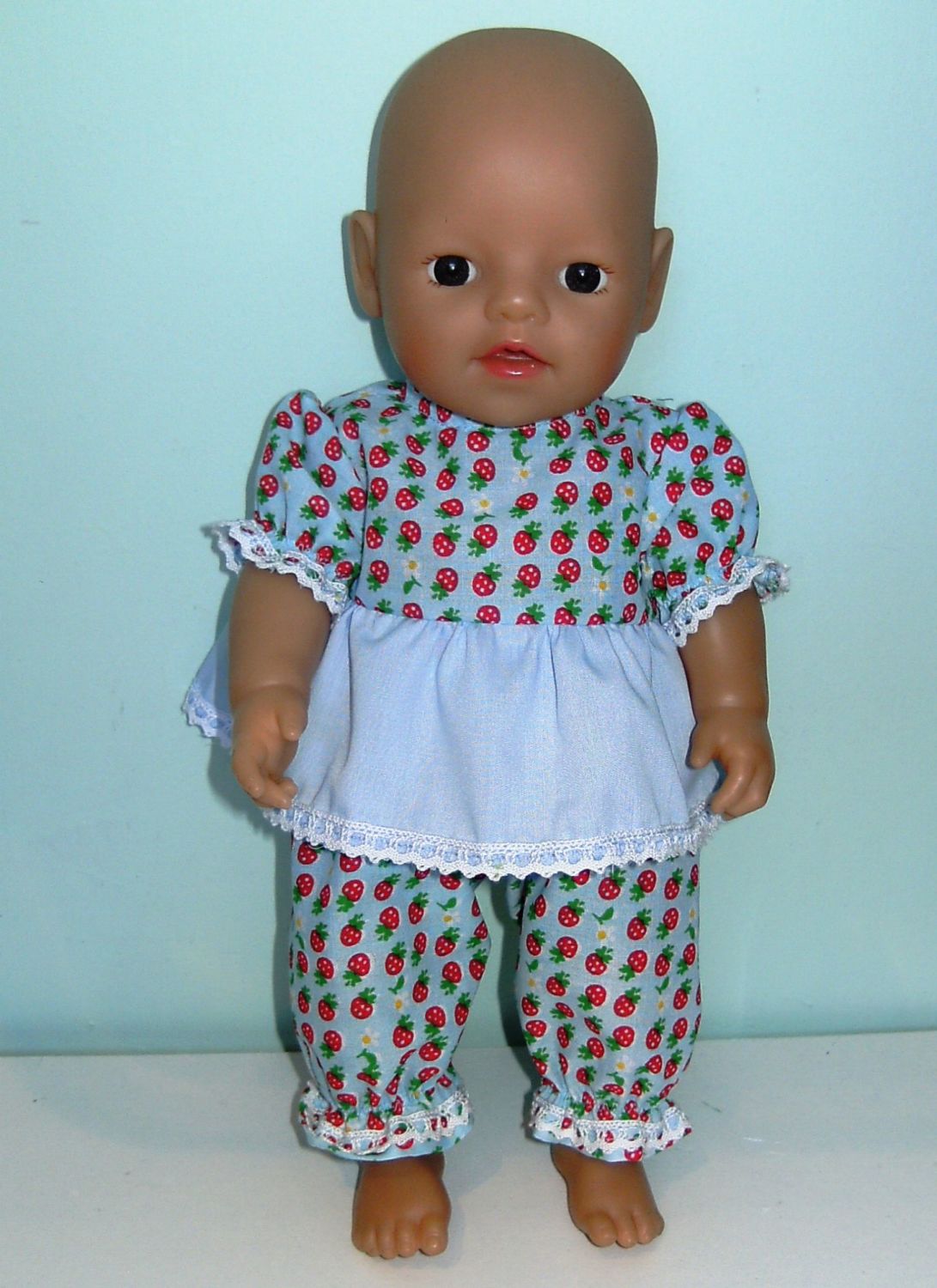 Doll's frilly pajamas to fit a 12 inch high baby doll