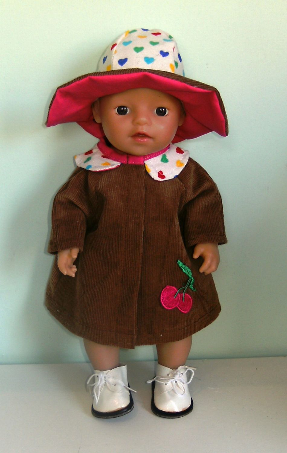 Doll's coat and hat set to fit 12 inch high baby doll