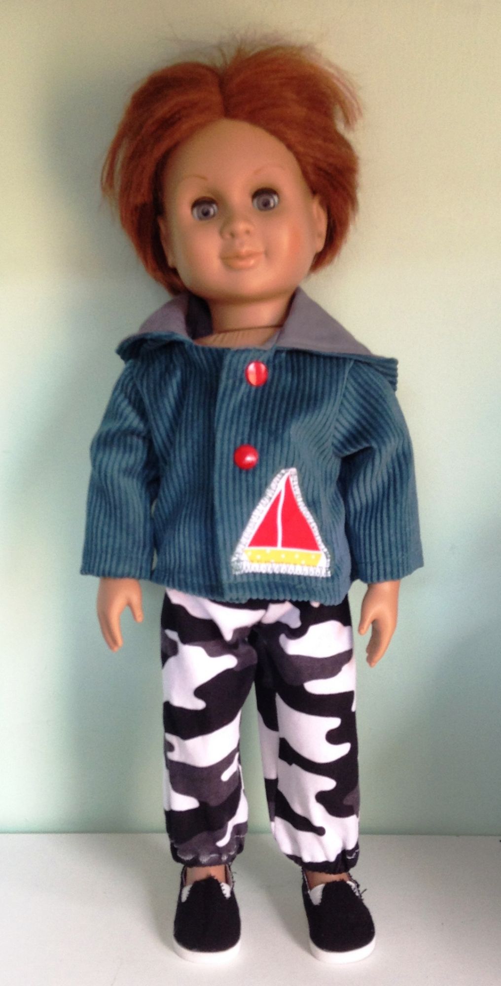 Doll's corduroy hooded jacket to fit a 18 inch high boy doll. Our
