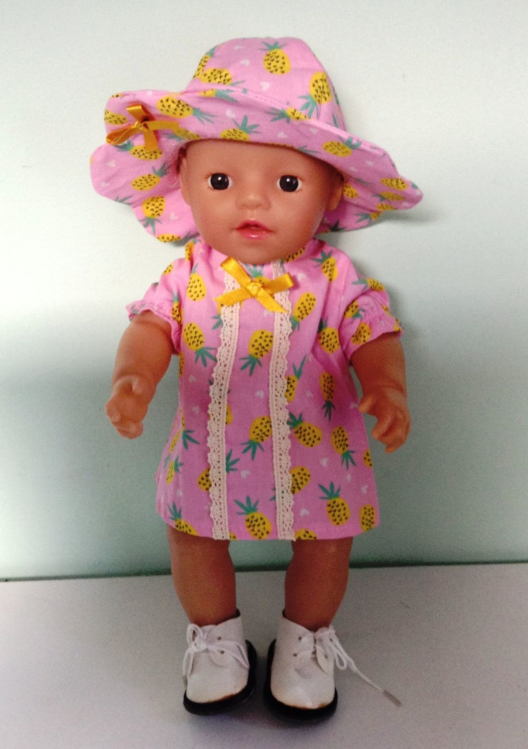 Doll's dress and sunhat to fit 12 inch high baby doll