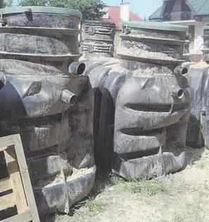 Bent plastic sewage treatment tank