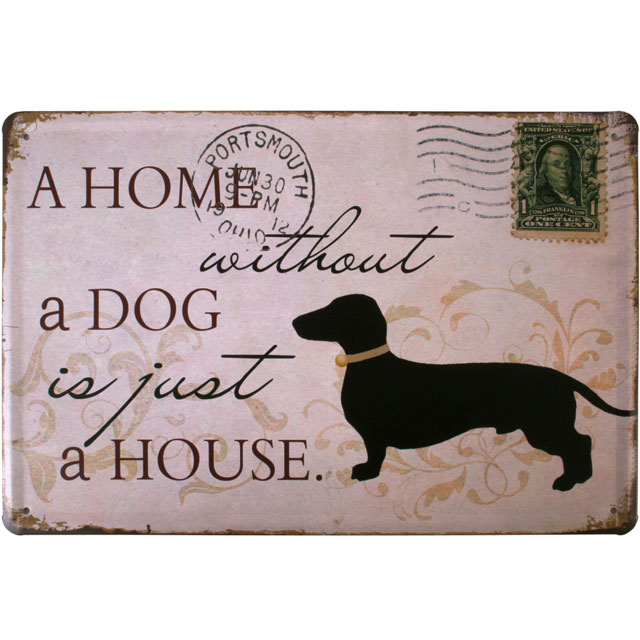 A metal shabby chic wall plaque in a dog design.