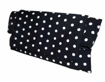 Black polka dot clutch bag