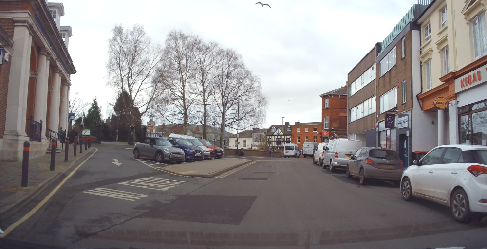 As shown in the picture on the left, if you were in the white car, have pulled up at the side of the road and the grey car pulls up in front of you, for you to drive on safely, you now need to reverse back, so you can see any traffic coming towards you, then pull out and back on to your side of the road.  This is what this manoeuvre helps you and teaches you to do,