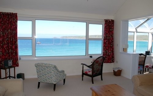 large sitting room with sea views