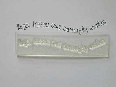 Hugs, kisses and butterfly wishes, wavy stamp