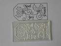 A Christmas tag stamp with holly 6x3cm