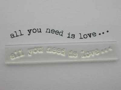 All you need is love stamp, wavy typewriter font 
