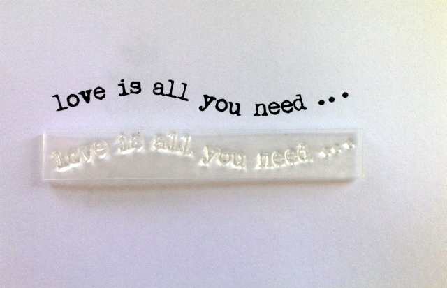 love is all you need stamp, wavy typewriter font 