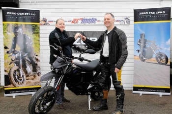 Fred Murphy from Redhill, Surrey, collecting the UKs first electric bike t