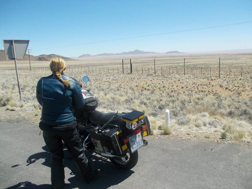 Myself, a 1970 BMW R75 - 5 and the Namib desert in background - Annerien Sc