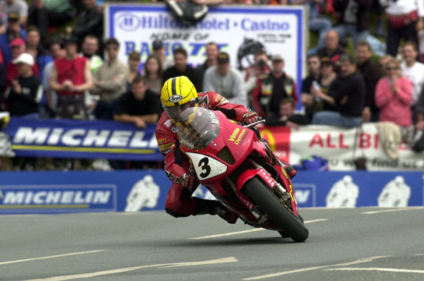 Joey Dunlop riding the SP1 Honda to victory in the F1 TT Race in 2000 on th