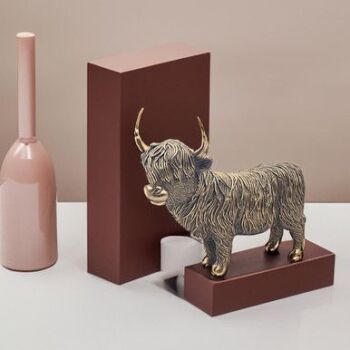 This is a Bronzed Highland Cow Large Desk Ornament