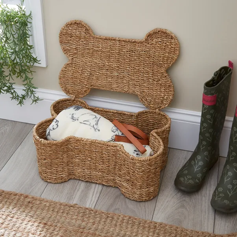 This is the Bone Shaped Seagrass Storage Basket from Dunhelm