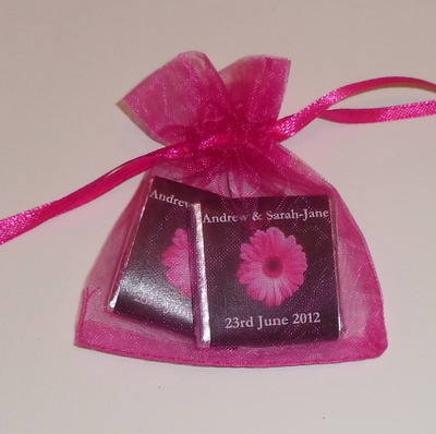 PINK GERBERA ON BLACK BACKGROUND - filled favour with 2 mini chocs