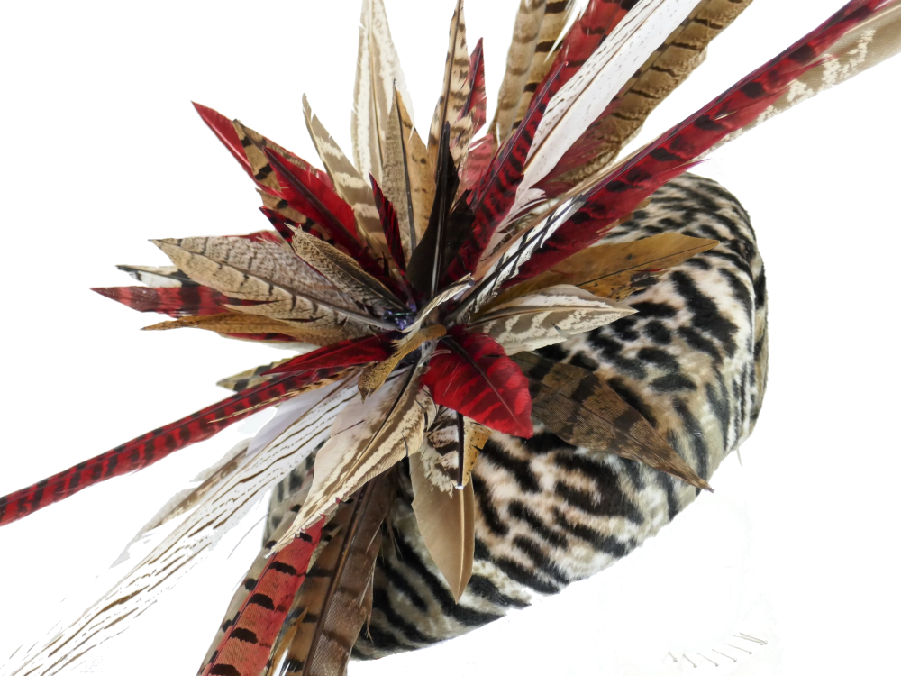 Animal print wedge pill with pheasant feather detail handmade by Anna at The Beverley Hat Co