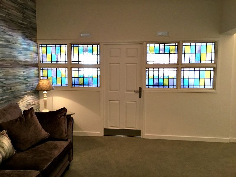 modern square design stained glass in windows