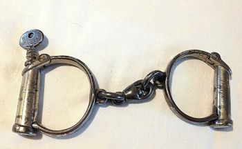 Antique No 5 Hiatt wrought hand cuffs with original key