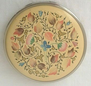 Vintage powder compact Coty enamelled top with raised gold accents beautiful