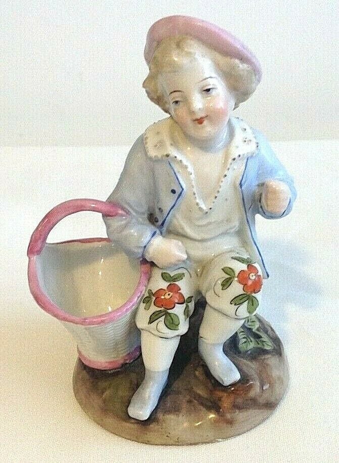 Antique Victorian fairing or Staffordshire figure little girl with toy doll