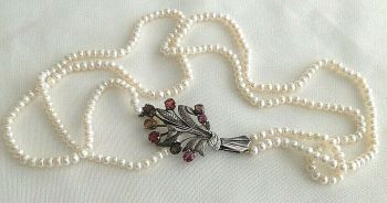 Antique Arts & Crafts pearl necklace sterling silver flower spray clasp set with Garnet stones Bernard Instone