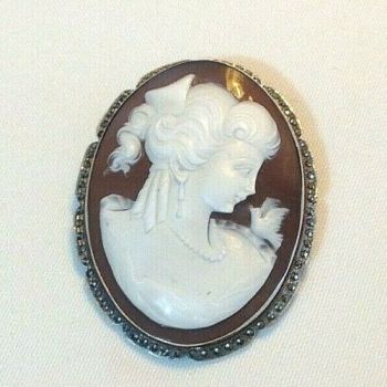 Vintage sterling silver carved cameo brooch pin mounted with marcasite stones