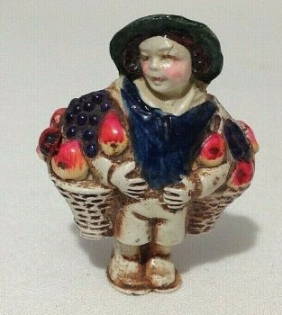 Antique novelty Celluloid tape measure boy Baskets of fruit with ladybird 
