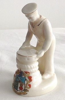 Antique WW1 crested china model of a sailor winding capstone Hythe Hants crest