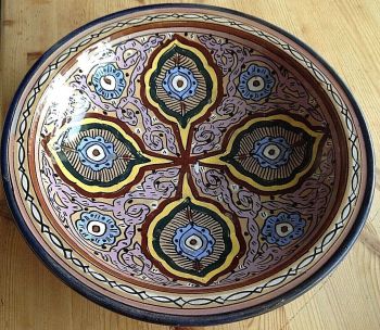 A large beautiful hand painted Moroccan pottery dish charger