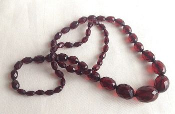 Antique graduated cherry amber faceted bead necklace hand knotted