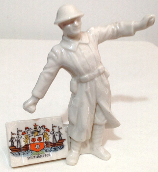 Antique WW1 crested china figure "The Bomb Thrower" Southampton crest