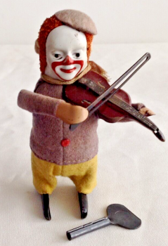 Antique Schuco clockwork toy clown playing violin very good condition