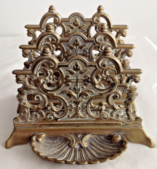 Antique or vintage embossed metal letter rack decorative