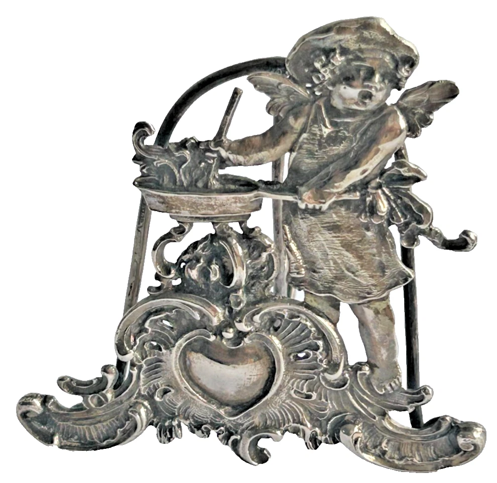 A Antique Sterling silver cherub menu holder continental C1900
