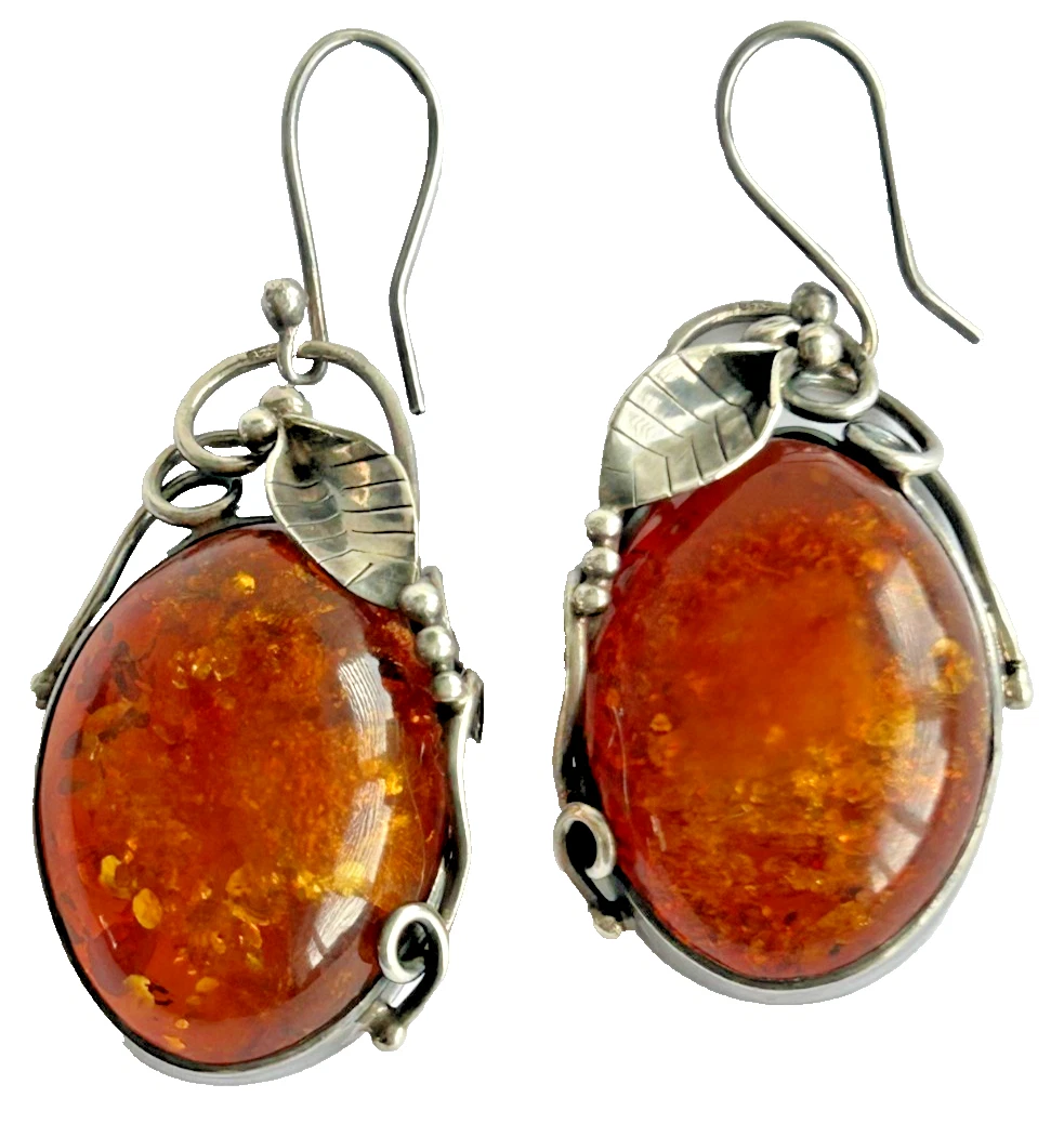 A pair of Vintage stylised sterling silver 925 large Baltic Amber hippy Boh