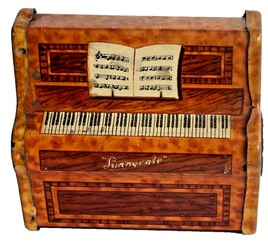 A Antique or vintage Novelty tin pencil sharpener Sunnyvale piano sheet mus