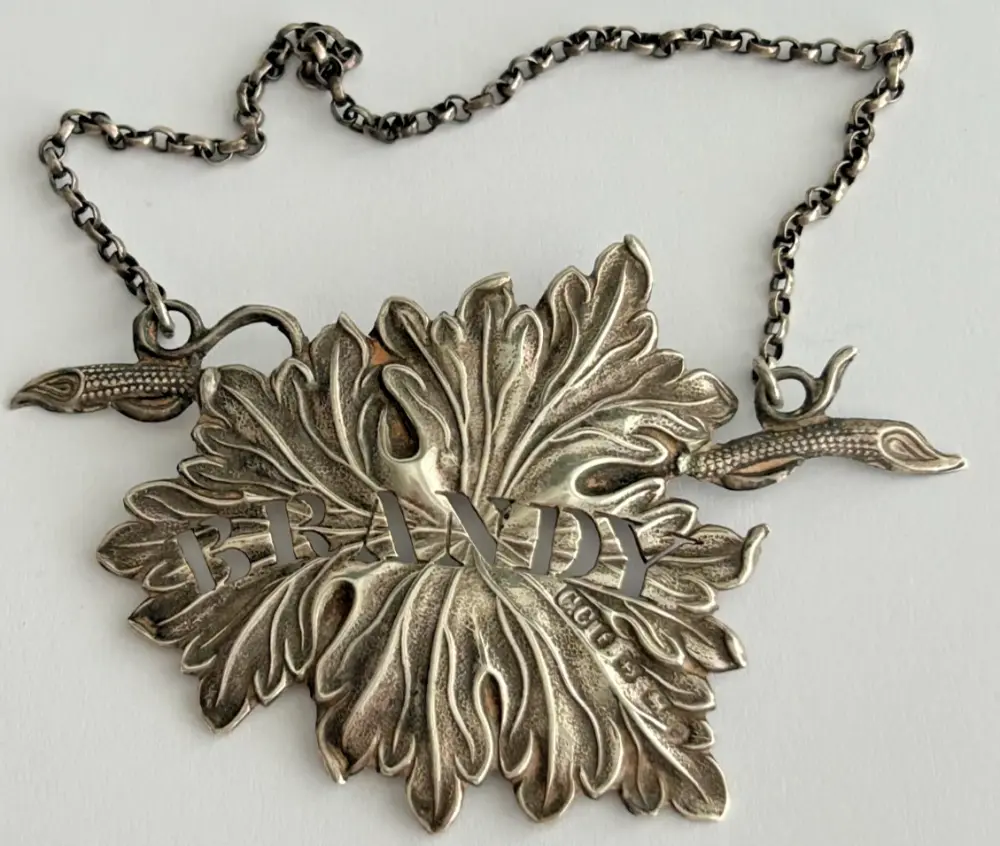 Antique Victorian Sterling Silver Brandy wine label hallmarked Charles Cook