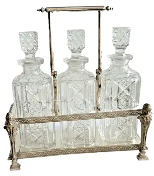 A Antique Victorian silver plated Neoclassical 3 cut glass decanter tantalus