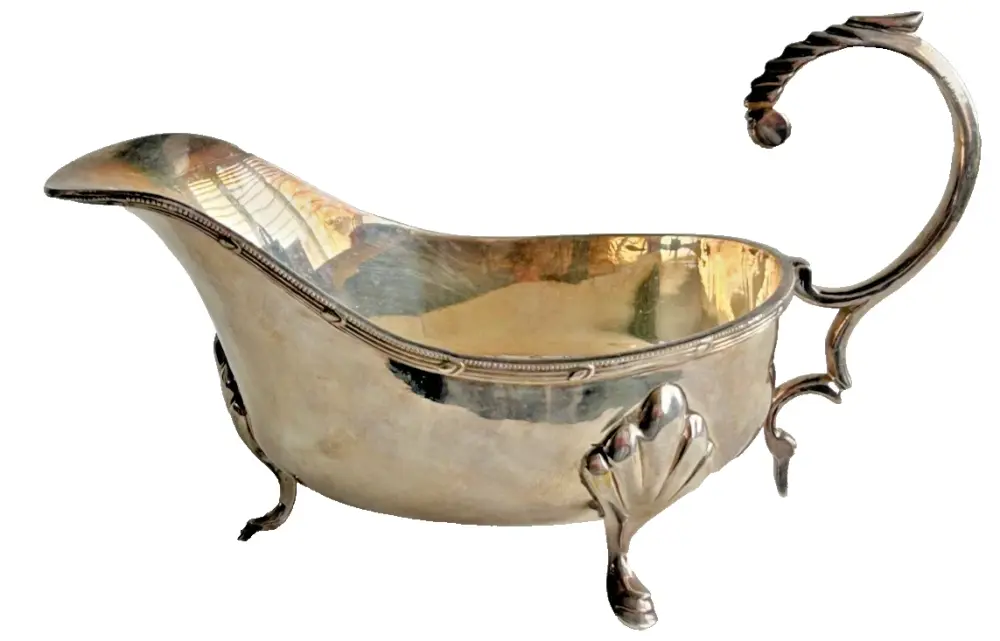 Antique silver plate gravy or sauce boat