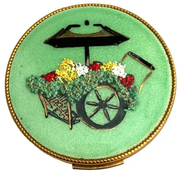 A Vintage green enamel Evans Powder Compact Flower Cart