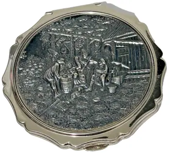 Vintage powder compact Stratton embossed party scene silver tone scalloped edge