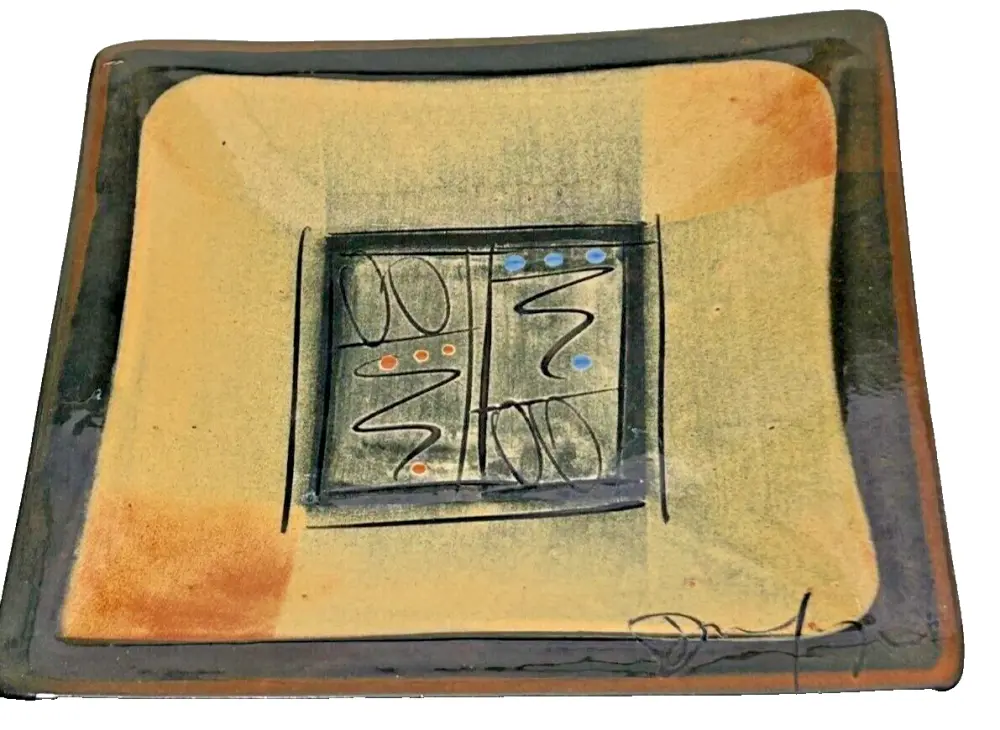 A studio pottery Plaque plate tile signed Francoise Dufayard