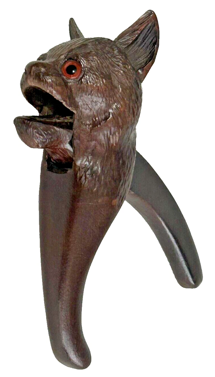 Antique carved Black Forest nutcrackers cat glass eyes novelty