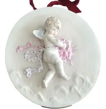 Antique bisque ceramic cherub plaque wall hanging possibly German