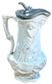An Antique Victorian embossed jug water nymphs and cherubs Dolphin lid Sam Alcock
