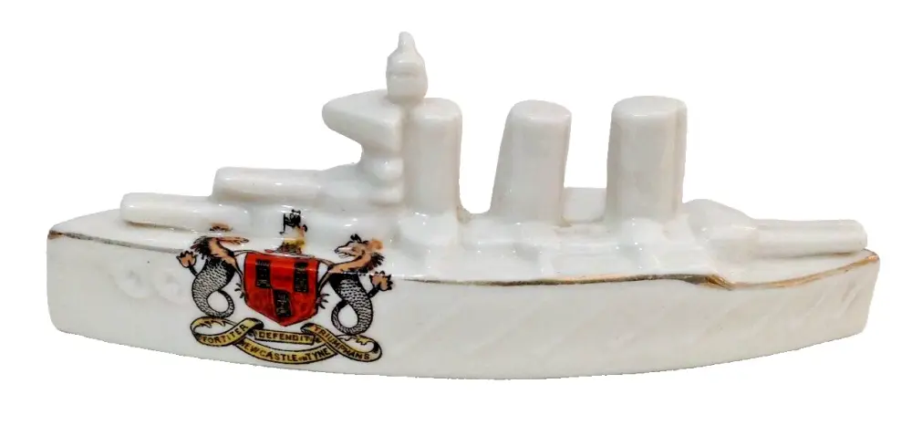 Antique WW1 crested china model of a war ship crest for Newcastle on Tyne